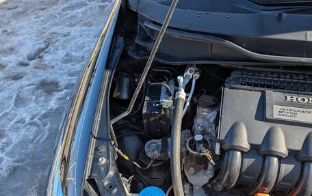 Honda Insight II рестайлинг, 2010 год, 850 000 рублей, 17 фотография