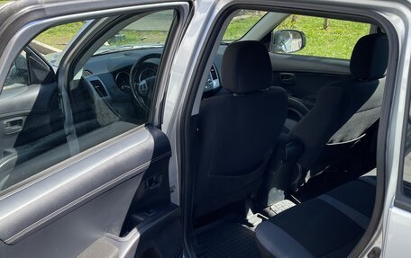 Mitsubishi Outlander III рестайлинг 3, 2011 год, 1 350 000 рублей, 6 фотография