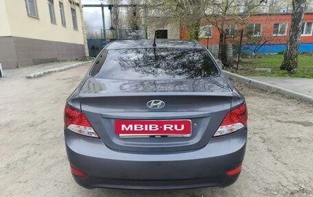 Hyundai Solaris II рестайлинг, 2011 год, 630 000 рублей, 8 фотография