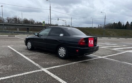 Mitsubishi Mirage VI рестайлинг, 2000 год, 270 000 рублей, 4 фотография