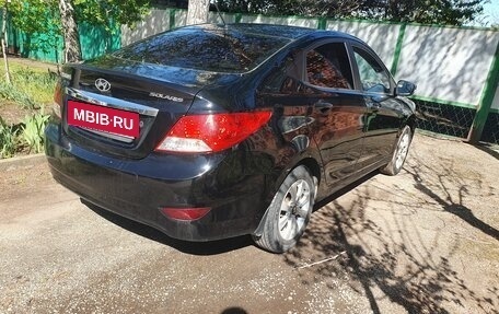 Hyundai Solaris II рестайлинг, 2011 год, 620 000 рублей, 3 фотография