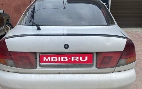 Mitsubishi Carisma I, 1998 год, 200 000 рублей, 1 фотография