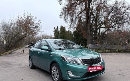 KIA Rio III рестайлинг, 2012 год, 990 000 рублей, 4 фотография