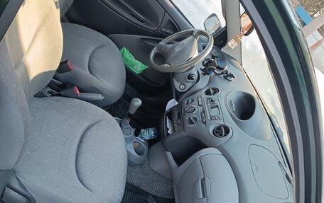 Toyota Yaris I рестайлинг, 1999 год, 410 000 рублей, 21 фотография