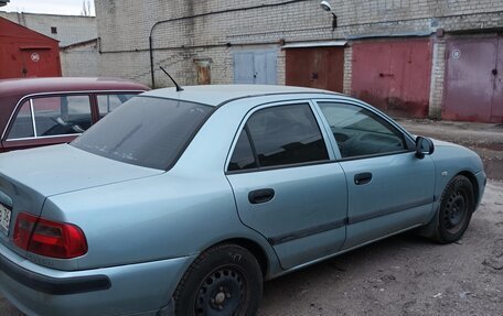 Mitsubishi Carisma I, 2003 год, 200 000 рублей, 11 фотография