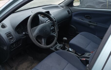 Mitsubishi Carisma I, 2003 год, 200 000 рублей, 18 фотография