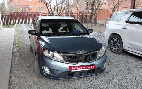KIA Rio III рестайлинг, 2013 год, 950 000 рублей, 2 фотография