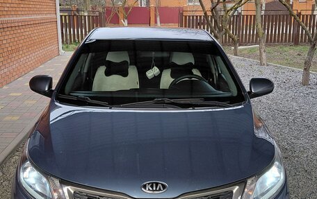 KIA Rio III рестайлинг, 2013 год, 950 000 рублей, 23 фотография