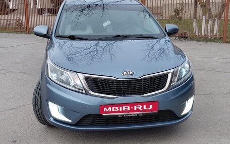 KIA Rio III рестайлинг, 2013 год, 950 000 рублей, 25 фотография