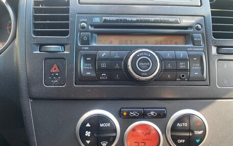 Nissan Tiida, 2010 год, 650 000 рублей, 9 фотография