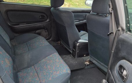 Mazda 323, 1997 год, 250 000 рублей, 9 фотография