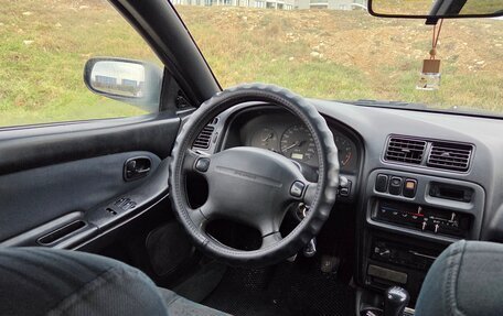 Mazda 323, 1997 год, 250 000 рублей, 10 фотография