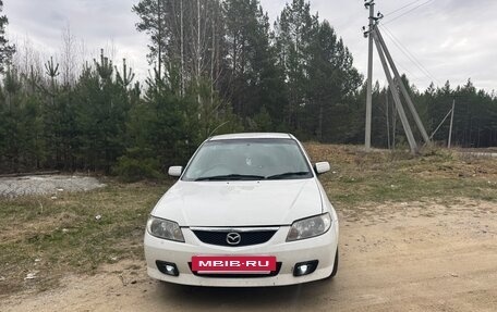 Mazda Familia, 2001 год, 310 000 рублей, 2 фотография