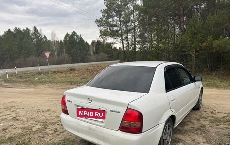 Mazda Familia, 2001 год, 310 000 рублей, 7 фотография