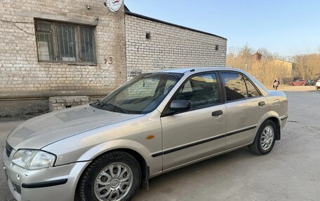 Mazda 323, 1999 год, 240 000 рублей, 3 фотография