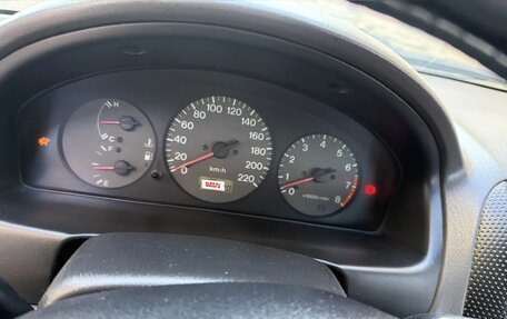 Mazda 323, 1999 год, 240 000 рублей, 5 фотография