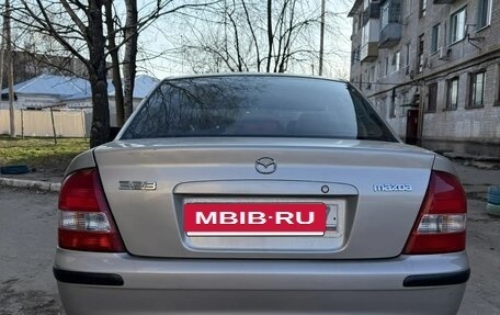Mazda 323, 1999 год, 240 000 рублей, 4 фотография