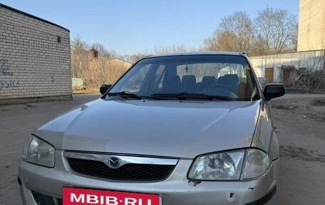 Mazda 323, 1999 год, 240 000 рублей, 9 фотография