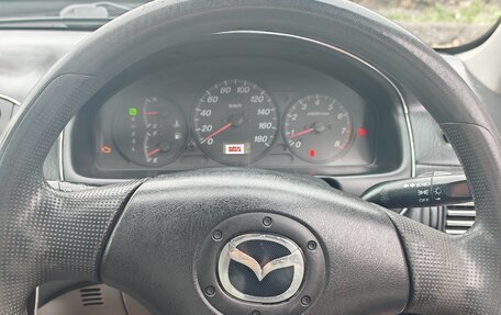 Mazda Familia, 2002 год, 360 000 рублей, 27 фотография