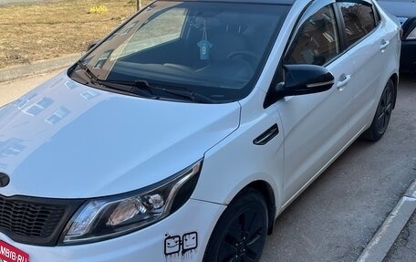 KIA Rio III рестайлинг, 2012 год, 700 000 рублей, 2 фотография