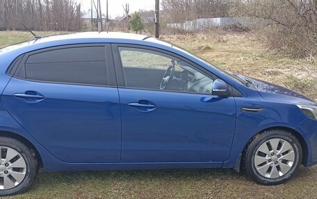 KIA Rio III рестайлинг, 2011 год, 700 000 рублей, 3 фотография