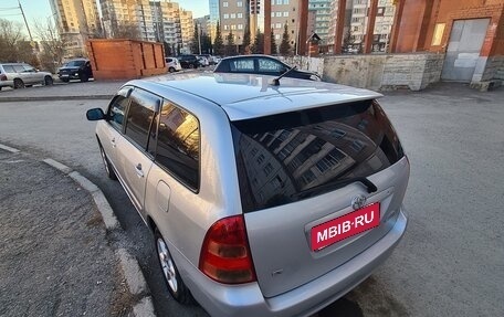 Toyota Corolla, 2004 год, 630 000 рублей, 4 фотография
