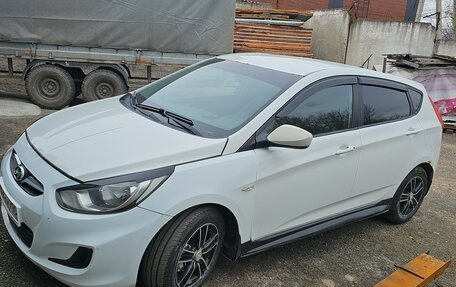 Hyundai Solaris II рестайлинг, 2011 год, 600 000 рублей, 13 фотография