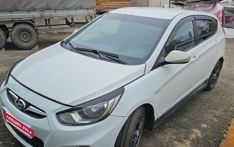 Hyundai Solaris II рестайлинг, 2011 год, 600 000 рублей, 20 фотография