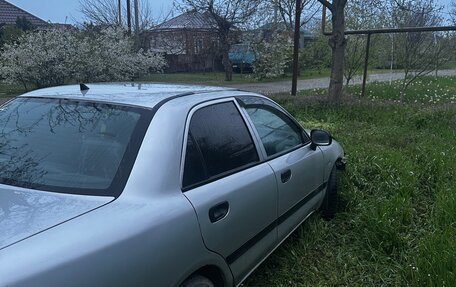 Mitsubishi Carisma I, 2002 год, 110 000 рублей, 4 фотография