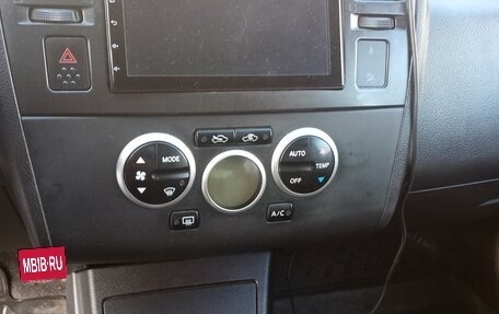 Nissan Tiida, 2010 год, 590 000 рублей, 8 фотография