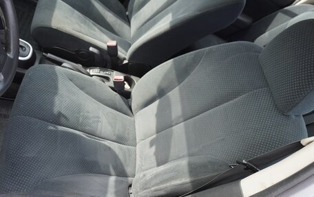 Nissan Tiida, 2011 год, 650 000 рублей, 4 фотография