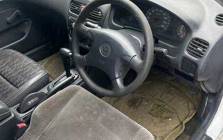 Mazda Familia Y11, 2001 год, 210 000 рублей, 22 фотография