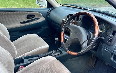 Mitsubishi Mirage VI рестайлинг, 1999 год, 450 000 рублей, 9 фотография