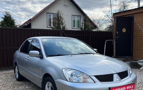 Mitsubishi Lancer IX, 2009 год, 699 000 рублей, 3 фотография