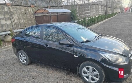 Hyundai Solaris II рестайлинг, 2011 год, 600 000 рублей, 3 фотография