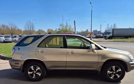 Lexus RX IV рестайлинг, 2000 год, 990 000 рублей, 3 фотография