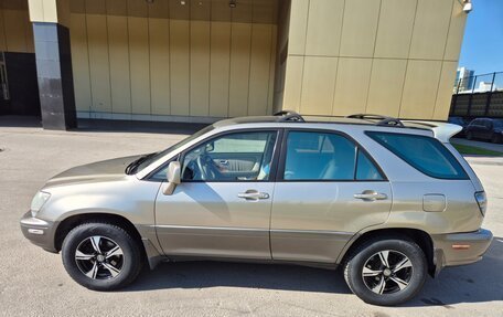 Lexus RX IV рестайлинг, 2000 год, 990 000 рублей, 5 фотография