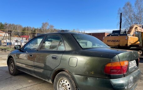 Mitsubishi Carisma I, 1997 год, 150 000 рублей, 2 фотография