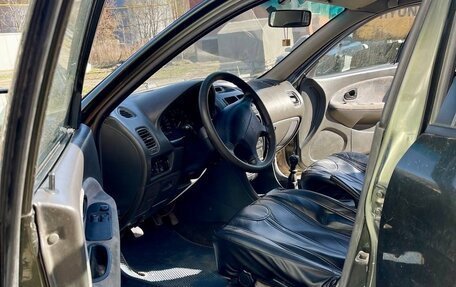 Mitsubishi Carisma I, 1997 год, 150 000 рублей, 10 фотография