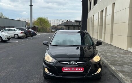 Hyundai Solaris II рестайлинг, 2011 год, 680 000 рублей, 12 фотография