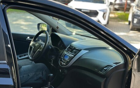 Hyundai Solaris II рестайлинг, 2011 год, 680 000 рублей, 26 фотография