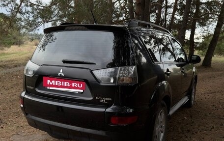 Mitsubishi Outlander III рестайлинг 3, 2010 год, 1 050 000 рублей, 4 фотография
