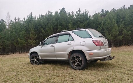 Lexus RX IV рестайлинг, 1999 год, 900 000 рублей, 3 фотография