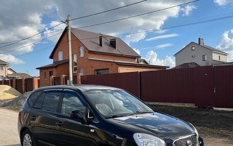 KIA Carens III (RP), 2011 год, 949 000 рублей, 3 фотография