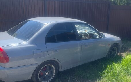 Mitsubishi Mirage VI рестайлинг, 1998 год, 290 000 рублей, 3 фотография