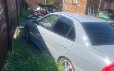 Mitsubishi Mirage VI рестайлинг, 1998 год, 290 000 рублей, 4 фотография