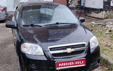 Chevrolet Aveo III, 2011 год, 3 фотография