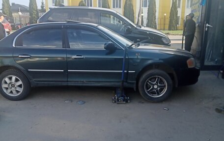 KIA Magentis I, 2004 год, 450 000 рублей, 16 фотография