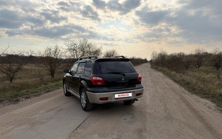 Mitsubishi Outlander III рестайлинг 3, 2007 год, 700 000 рублей, 2 фотография