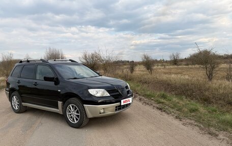 Mitsubishi Outlander III рестайлинг 3, 2007 год, 700 000 рублей, 4 фотография